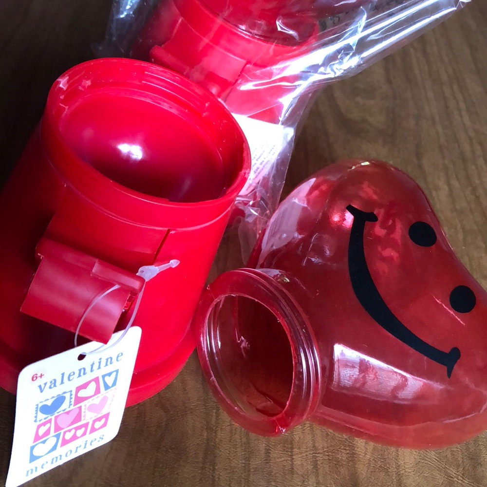 A set of 2 heart dispensers